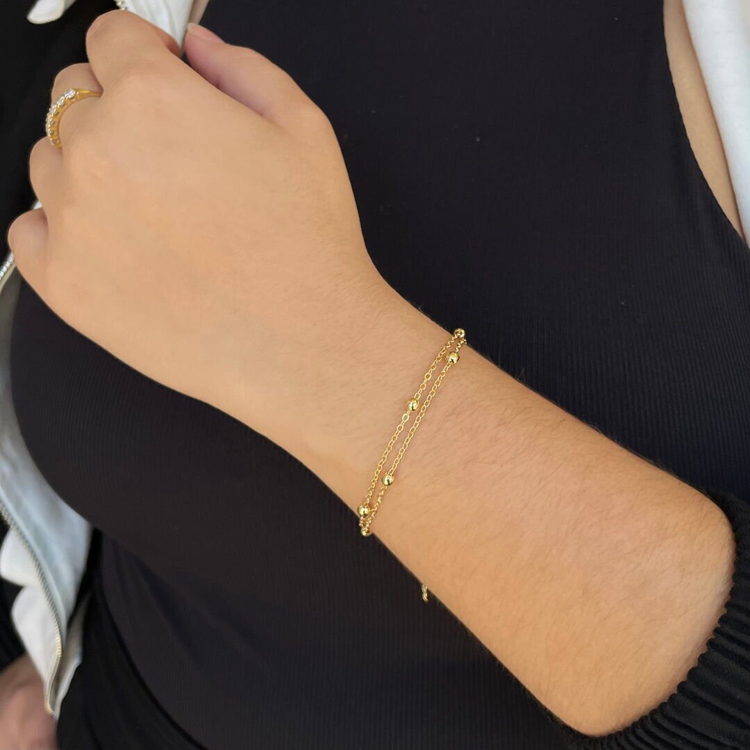 Pulseira Dupla de Bolinhas Cheias Lisa Dourada